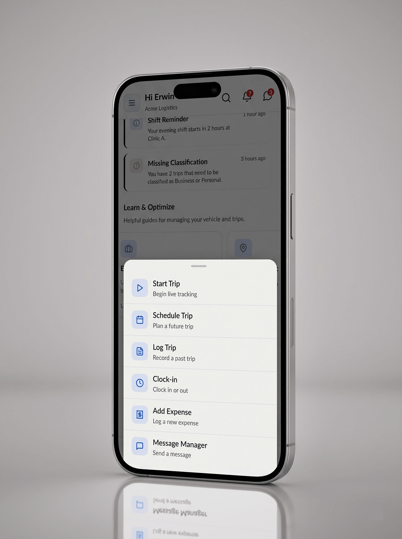 The floating action button expanded into a sheet listing Start Trip, Schedule Trip, Log Trip, Clock-in, Add Expense, and Message Manager.