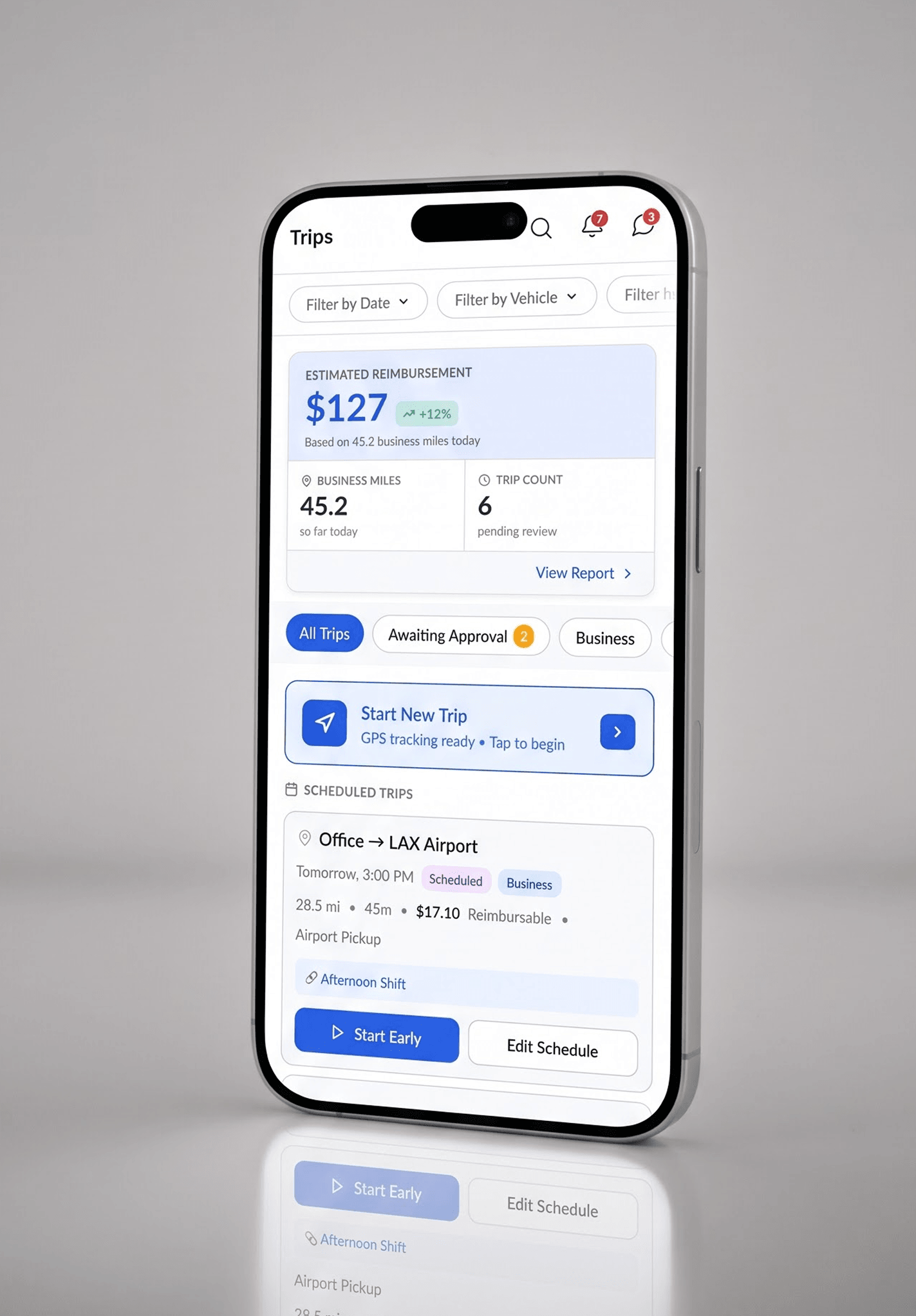 Trips screen with cards showing route, status, business or personal classification, distance, duration, and reimbursable amount.